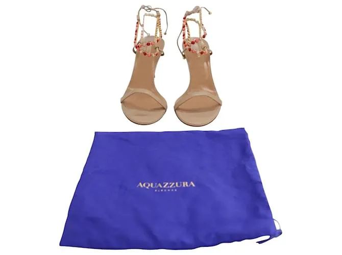 Aquazzura Livia 75 Sandalias con pedrería en piel beige 