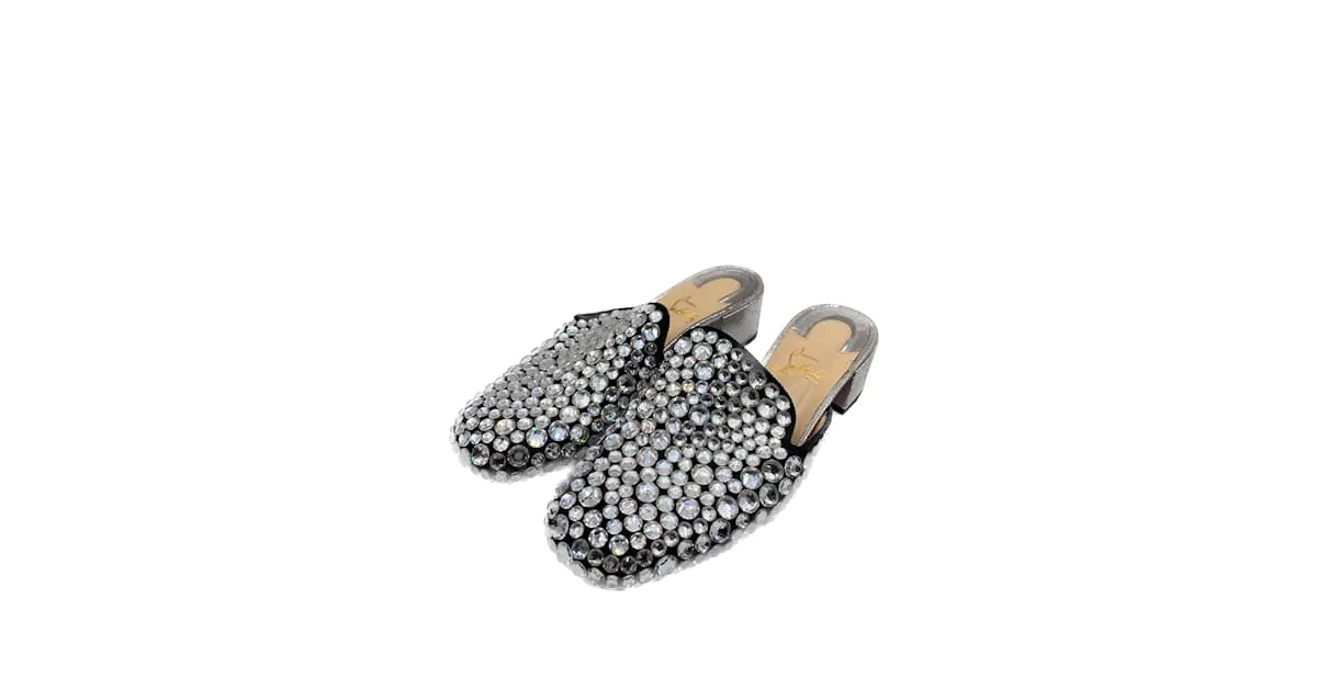 CHRISTIAN LOUBOUTIN Mules y zuecos T.UE 39 Resplandecer Plata 