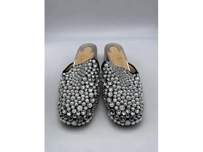 CHRISTIAN LOUBOUTIN Mules y zuecos T.UE 39 Resplandecer Plata 