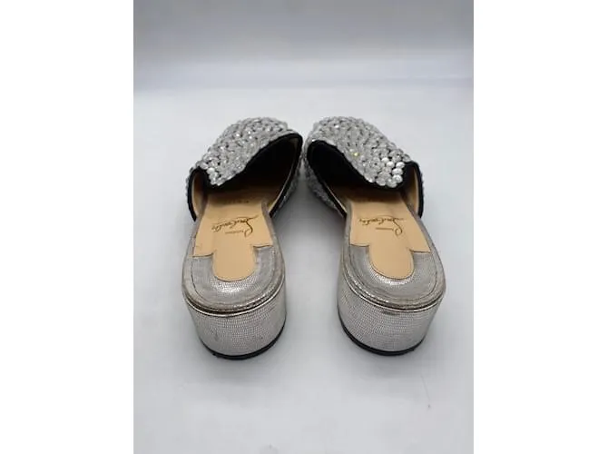 CHRISTIAN LOUBOUTIN Mules y zuecos T.UE 39 Resplandecer Plata 