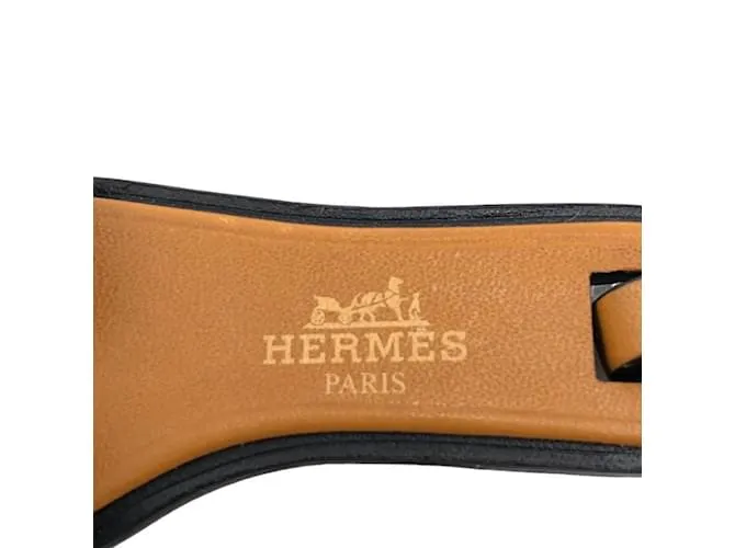 Correa Charm Nano Oran de Hermès Castaño Blanco 