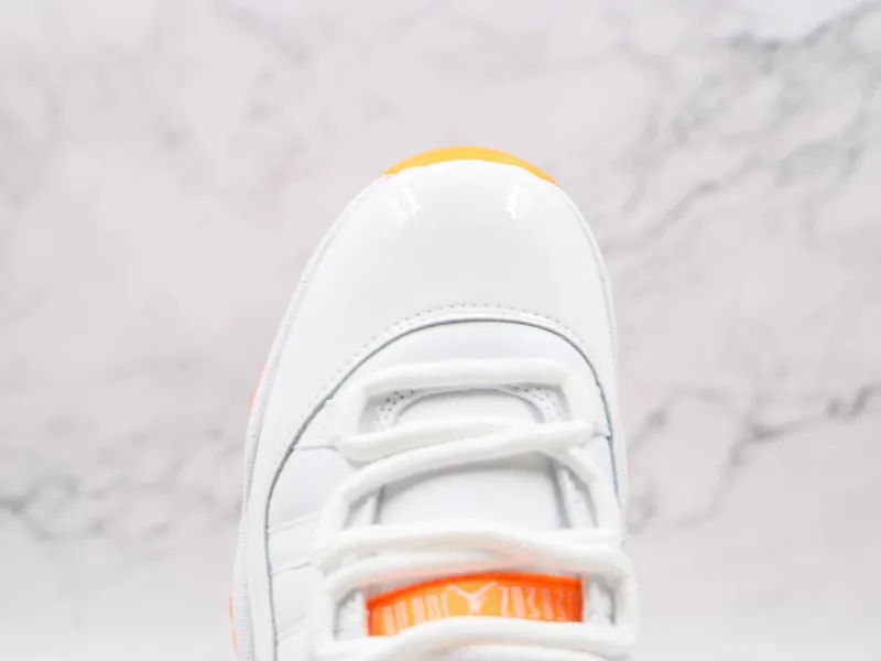 Nike Air Jordan 11 Low “Bright citrus” Modelo 103M