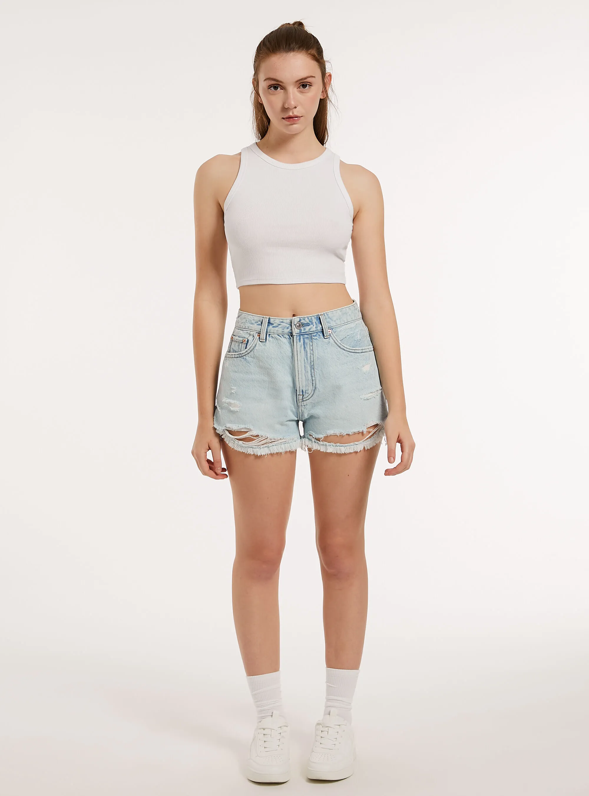 Shorts in denim con rotture