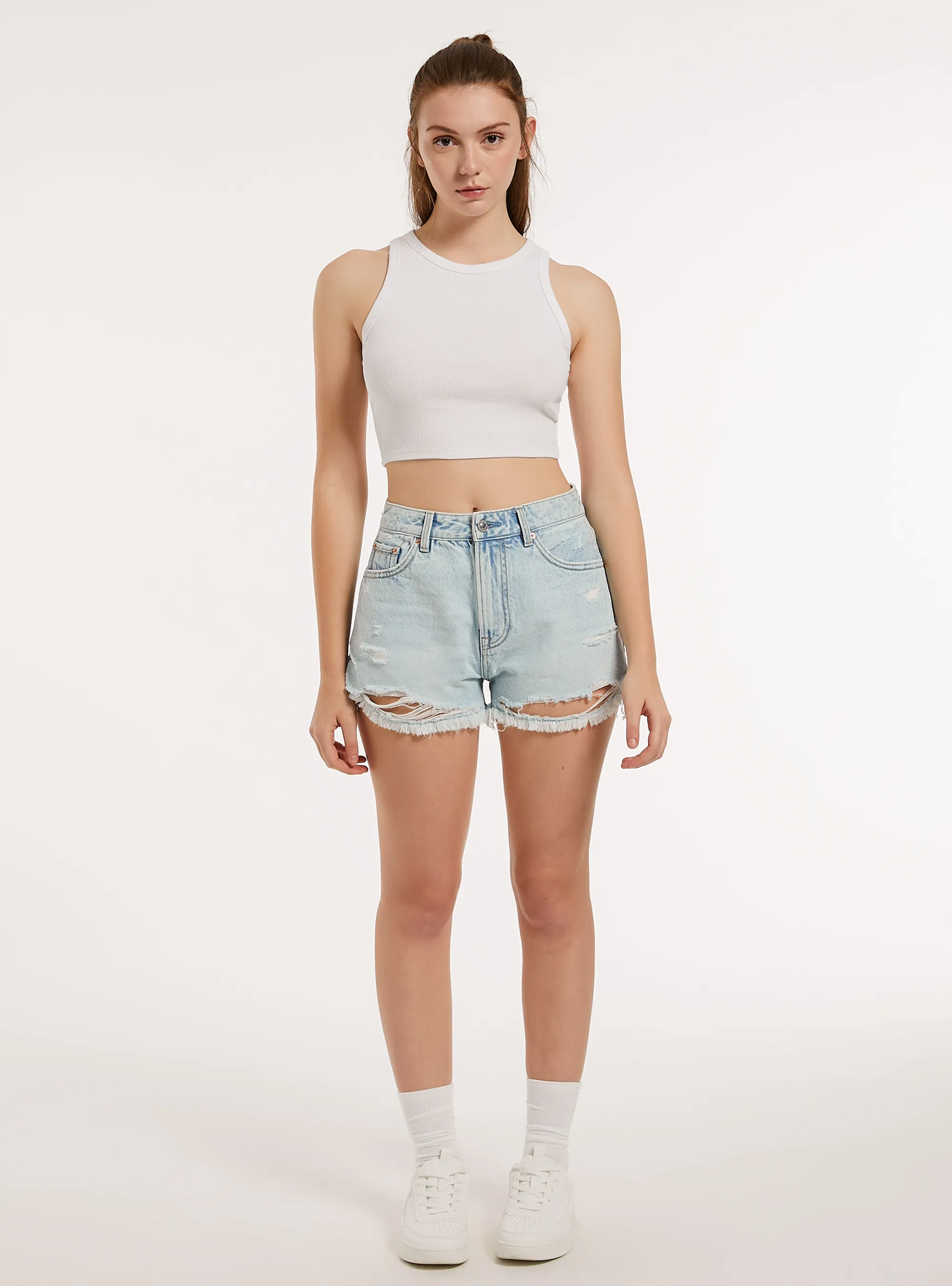 Shorts in denim con rotture